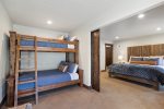 Bunk beds lead into the master bedroom suite. 